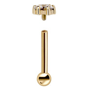 Exploded view of 14k yellow gold triple CZ cartilage stud showing threaded top and barbell post separately