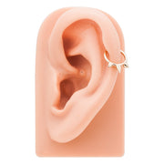 14K gold triple spike seam ring worn in cartilage piercing on ear model for fit reference