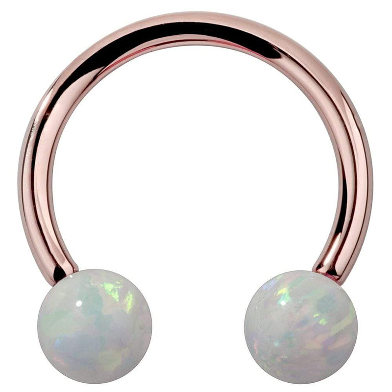14k rose gold circular barbell with iridescent white opal ball ends, front view